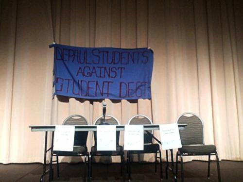 Empty seats reserved for the administration at the DePaul Public Forum on Tuition Hikes.