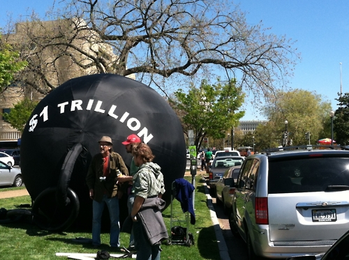 Occupy Student Debt was there today working with the Backbone Campaign for the student debt campaign.  A $1trillion ball of student debt (15 ft in diameter) was carried to Sallie Mae and the Dept of Education by all the debt slaves.